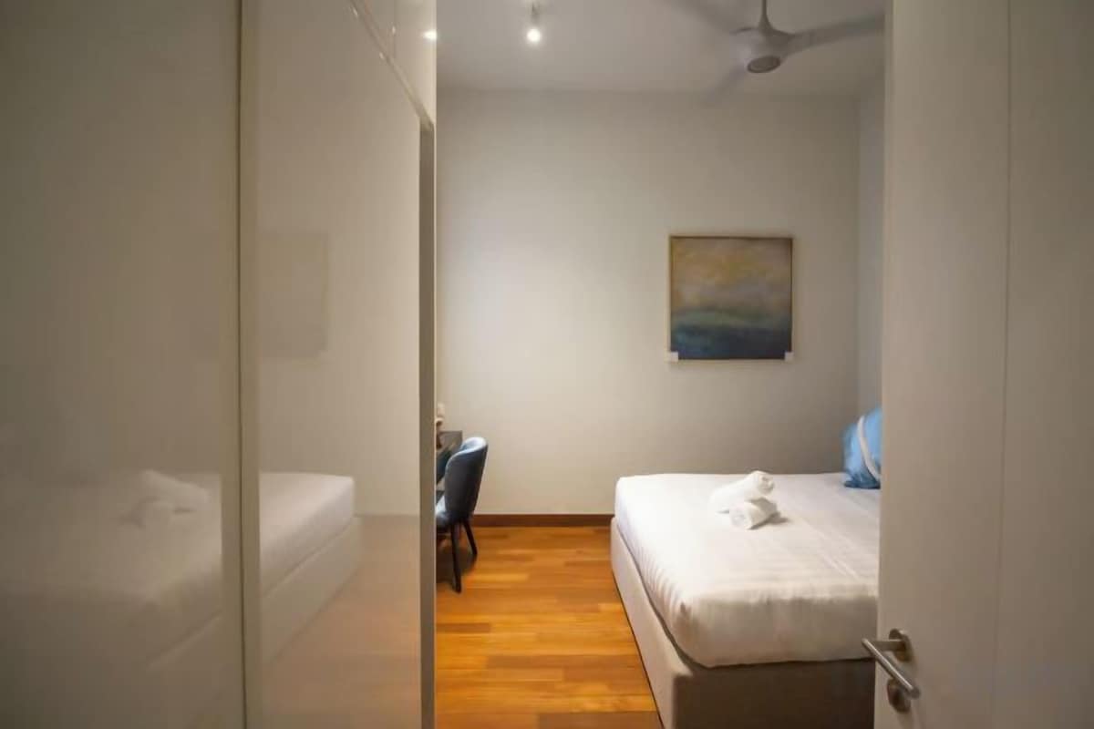 Premium bedding, desk, blackout drapes, iron/ironing board