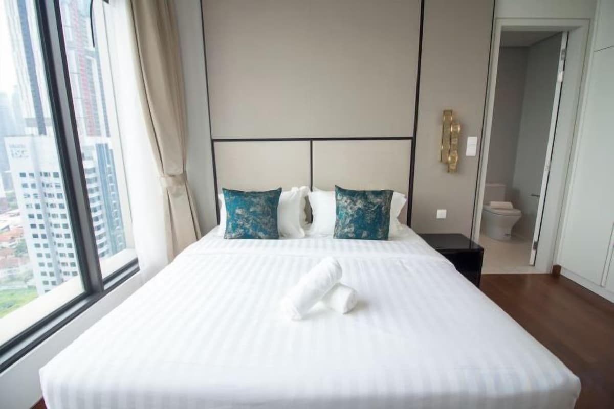Premium bedding, desk, blackout drapes, iron/ironing board