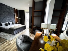 Premium bedding, down comforters, pillowtop beds, minibar