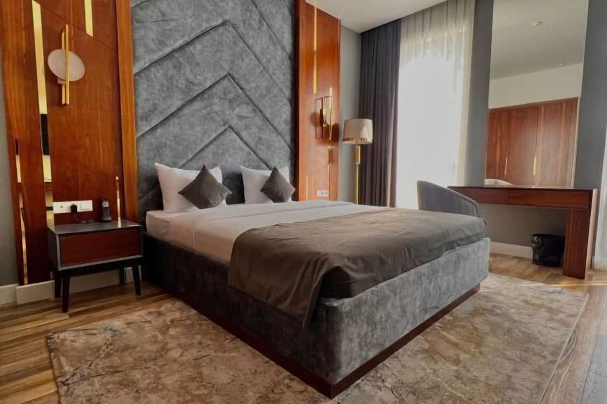 Premium bedding, down comforters, pillowtop beds, minibar