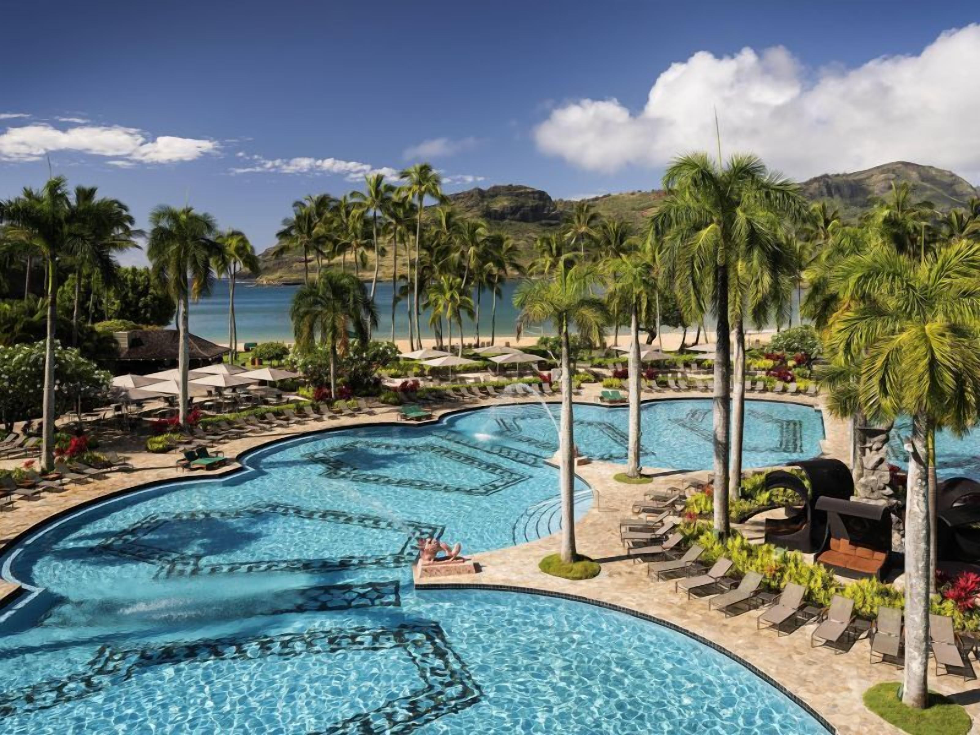 Walking Distance from Kalapaki Beach! Parking, Outdoor Pool, Shuttle Service!