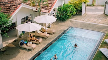 Outdoor pool, open 7:00 AM to 8:00 PM, sun loungers