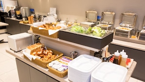 A buffet setup with various food items, including bread, salads, and condiments. - Kuretake-inn Premium Fujinomiya (Fujinomiya)