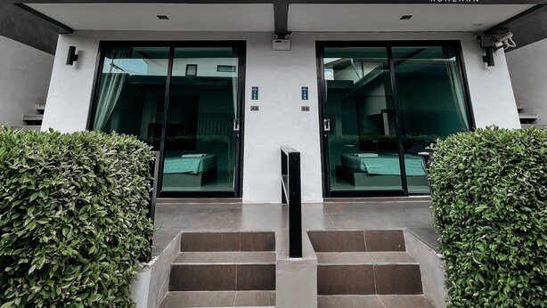 A modern building with a sign reading "The Seacret Koh Larn".