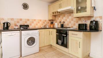 Fridge, electric kettle, toaster, cookware/dishes/utensils