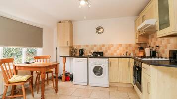 Fridge, electric kettle, toaster, cookware/dishes/utensils