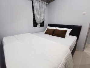 Familjelägenhet - 2 sovrum | 2 sovrum, sängtillbehör av högsta kvalitet, duntäcken och minibar