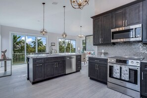 House, Multiple Bedrooms | Private kitchen | Fridge, oven, coffee/tea maker, toaster