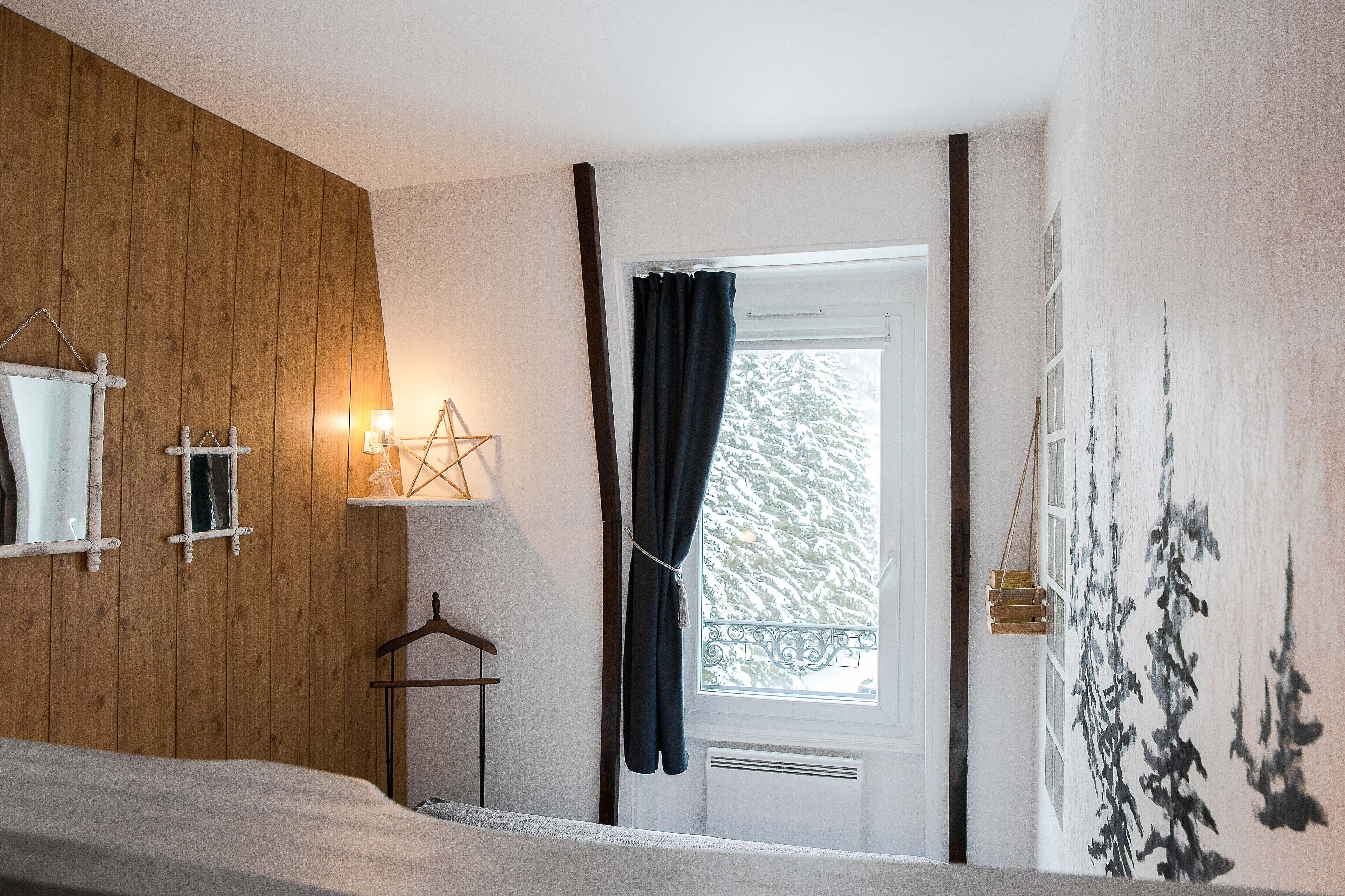 1 bedroom, desk, iron/ironing board, travel crib