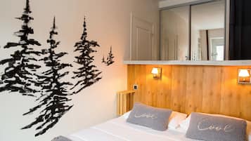 1 bedroom, desk, iron/ironing board, travel crib