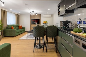 Economy Apartment, 1 Bedroom | Private kitchen | Fridge, microwave, oven, stovetop - BayMari Suites City Life (Istanbul)