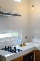 Fridge, microwave, stovetop, cookware/dishes/utensils