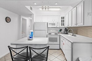 Fridge, microwave, oven, dishwasher - Jetty view enclosed balcony. One free beach chair set up daily. (Destin)