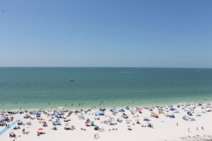 On the beach, sun-loungers, beach towels