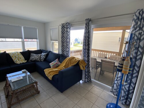 One mile to the beach!  2 br condo with deck, A/C, full kitchen, washer, dryer