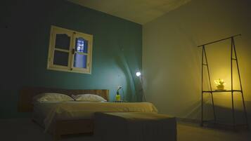 Comfort Room | Desk, laptop workspace, blackout drapes, iron/ironing board