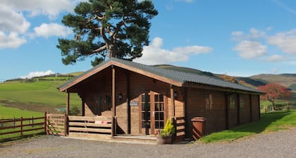 Stunning log cabin Berwyn with private Hot Tub