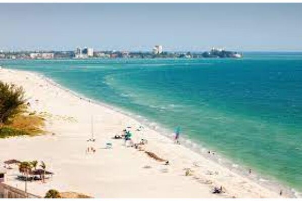 Guests can enjoy a serene beach experience with access to the shoreline.