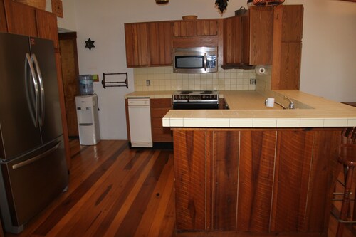 UNIQUE ROUNDED WOOD HOUSE WITH STUNNING ARCHITECTURAL DESIGN