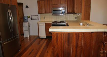 UNIQUE ROUNDED WOOD HOUSE WITH STUNNING ARCHITECTURAL DESIGN