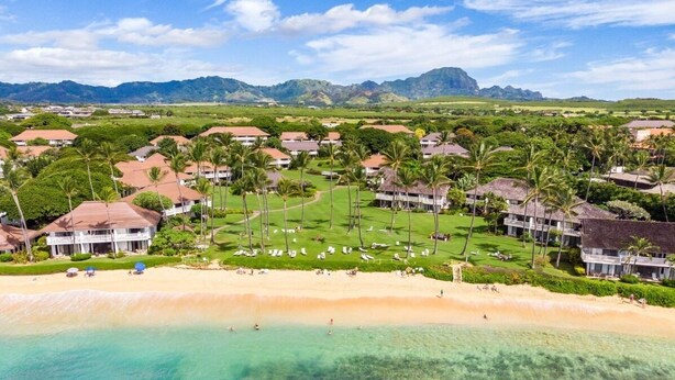 A resort with beachfront villas, a golf course, and a beach. - NEW! Top Floor Views with A/C in Poipu Beach, Resort Amenities (Koloa)