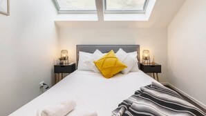 2 habitaciones, tabla de planchar con plancha y wifi gratis 