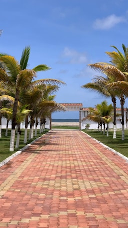 On the beach, beach towels. La Mar Hotel Playas