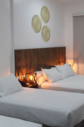 Family Quadruple Room, Garden View | Frette Italian sheets, premium bedding, down duvets, Select Comfort beds