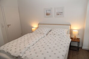 2 bedrooms, iron/ironing board, WiFi - Lieblingsort - Neubauwohnung mit Hund für bis zu 4 Personen im Greetsieler Grachtenpark (Krummhörn)