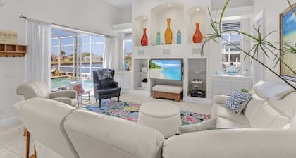 This Villa has it all! Waterfront - boat dock, tiki hut, hot tub, sauna & pool!