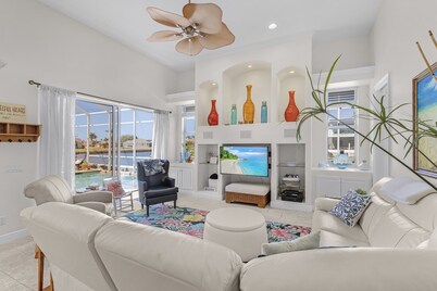 This  Villa has it all! Waterfront - boat dock, tiki hut, hot tub, sauna & pool!