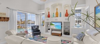Boater's dream! Waterfront, pool large dock, tiki hut, hot tub and sauna.