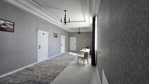 32-inch flat-screen TV with digital channels, pay films, printers