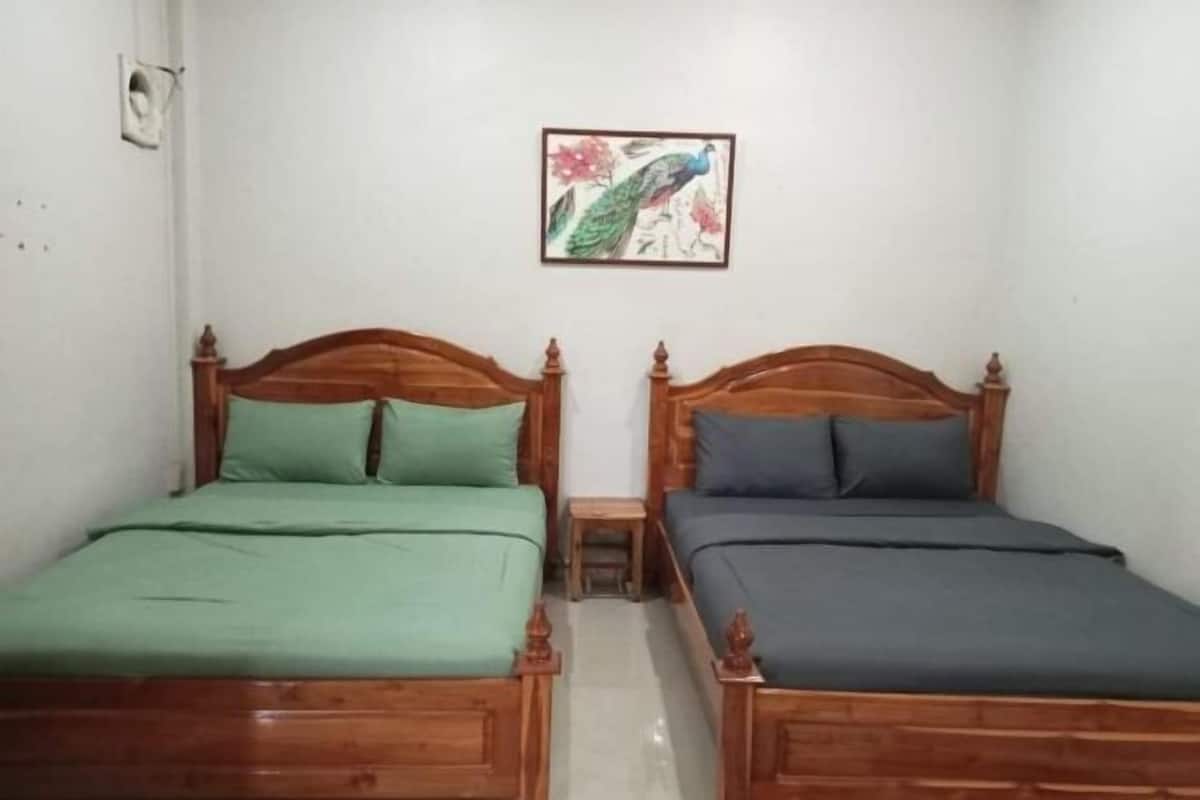 Espacio para trabajar con laptop, wifi gratis y ropa de cama