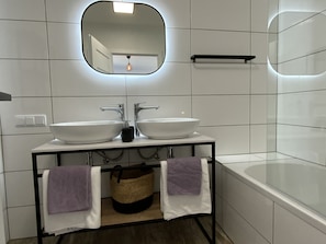 Hair dryer, towels, soap, toilet paper
