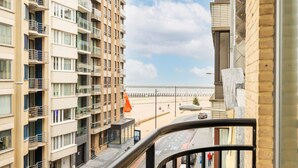A high-rise building with multiple balconies overlooking a beach. - Apartment in Oostende With Balcony (Ostend)