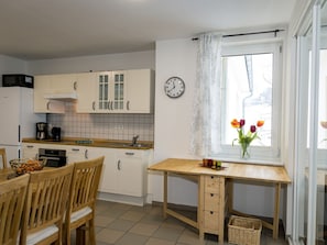 Appartement | Cuisine privée | Chaise haute