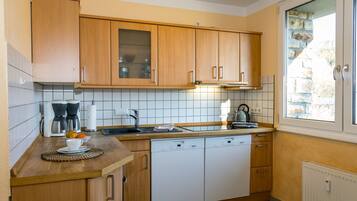 Apartment | Private kitchen | Electric kettle, highchair