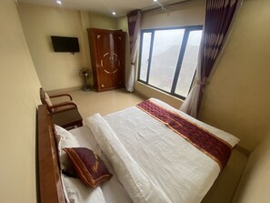 Memory-foam beds, desk, free WiFi