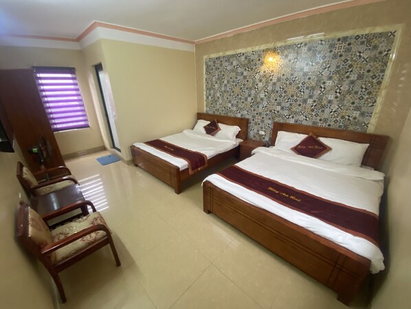 Memory-foam beds, desk, free WiFi