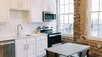 Standard Suite, 2 Bedrooms | Private kitchen | Microwave, oven, stovetop, dishwasher