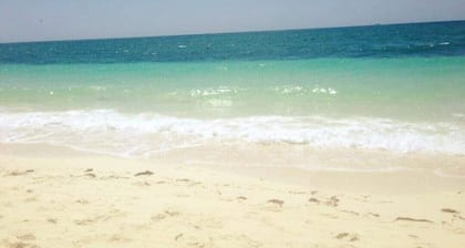 Cozy Garden Unit in Lucaya area is a 2 minute walk to the spectacular beach.