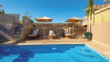 Indoor pool, free pool cabanas, pool umbrellas