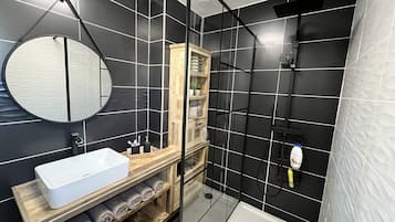 Shower, eco-friendly toiletries, hair dryer, towels