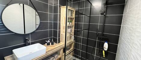 Shower, eco-friendly toiletries, hair dryer, towels