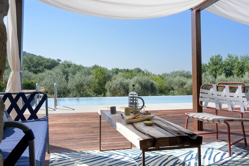 Experience Cortona at modern and cozy Qi Villa & Spa