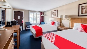 A hotel room with two beds, a desk, a chair, a coffee machine, and a window. - Hotel Wadsworth OH I-76 (Wadsworth)