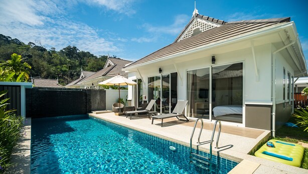 A swimming pool with a sun terrace, lounge chairs, and a covered seating area. - Kamala Garden View villa by Lofty  (Kamala)