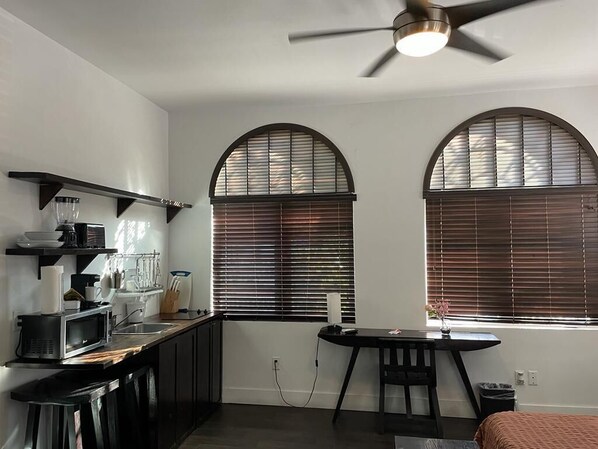 Fridge, microwave, stovetop, coffee/tea maker