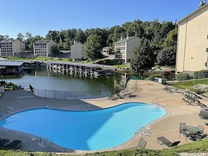 Relax by the pool and enjoy boating activities from the adjacent dock.
